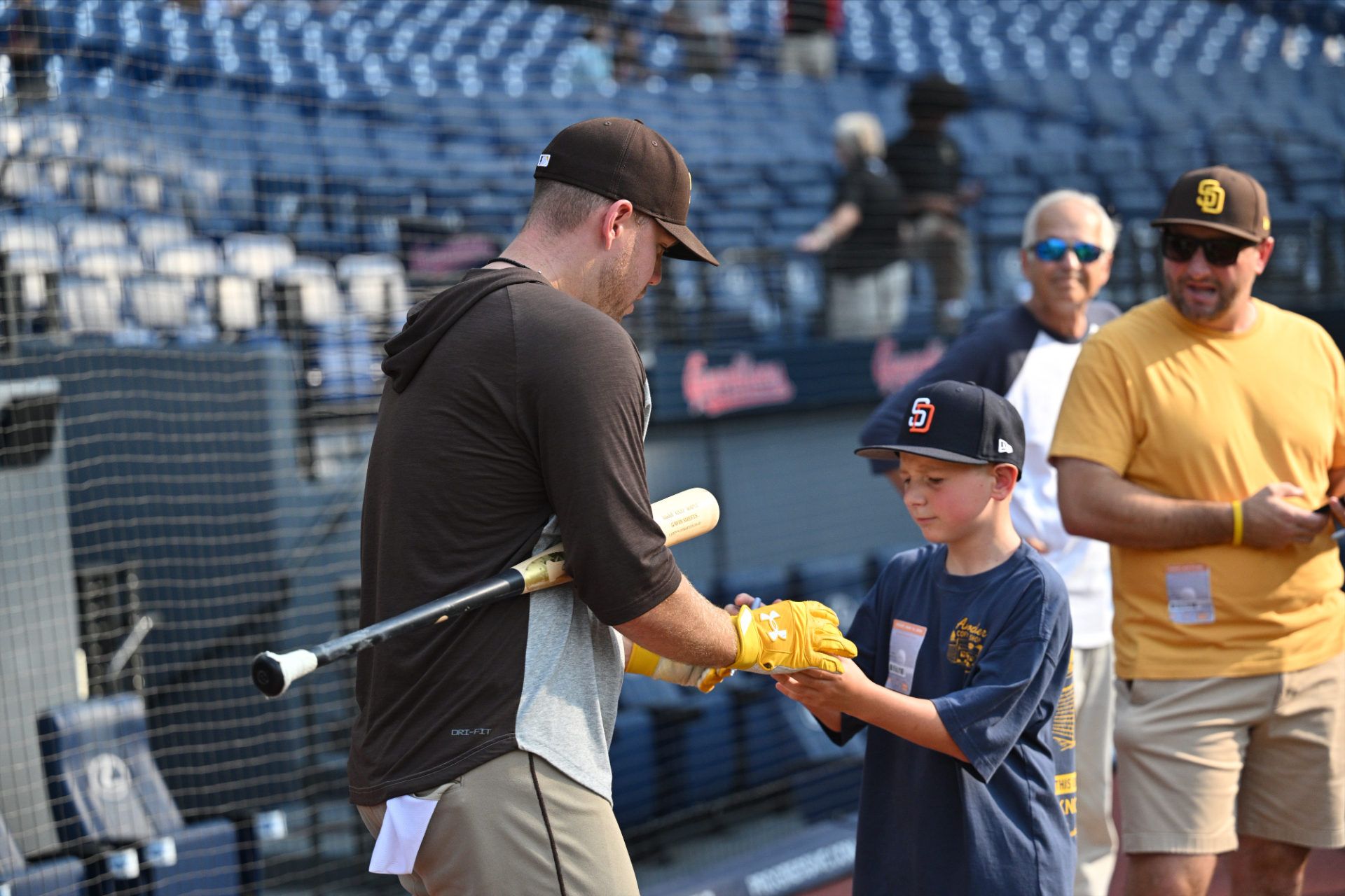 Gavin Sheets with a fan